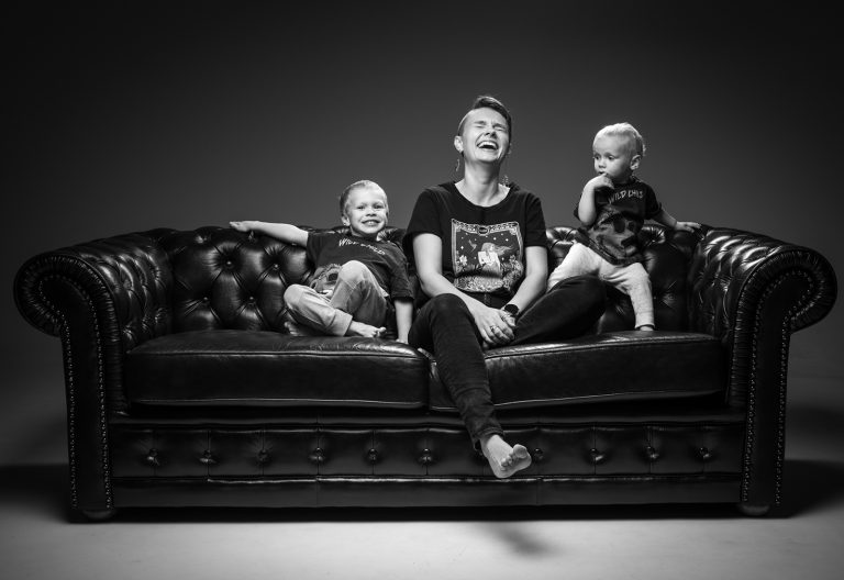 Mother and kids on couch in photography session