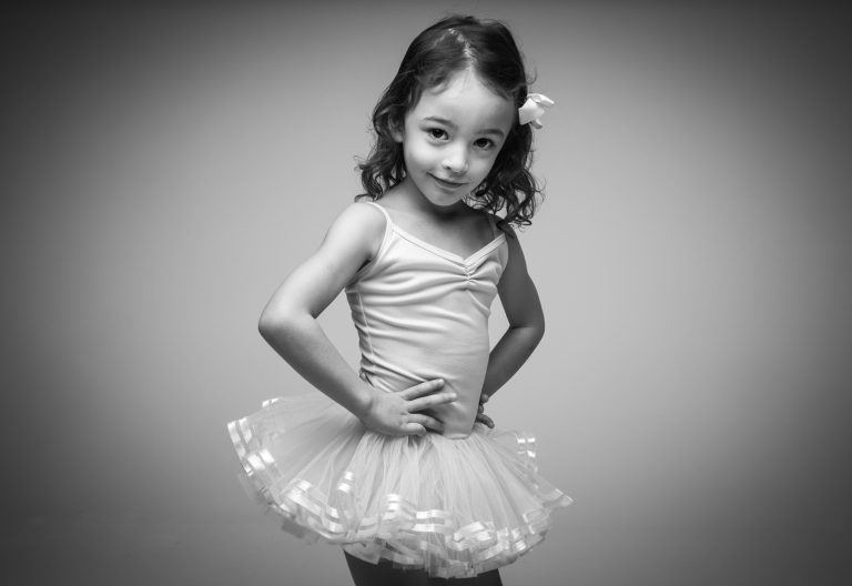 Girl in ballet dress in photography session