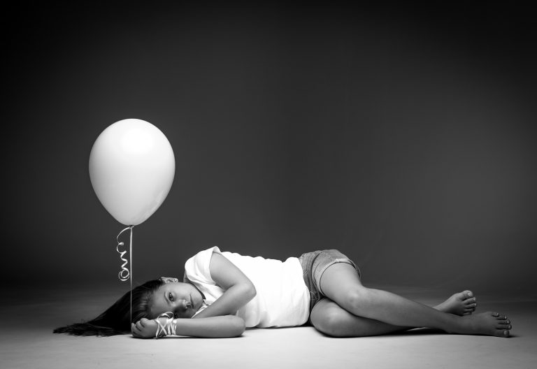 Girl with balloon in kids photography photoshoot