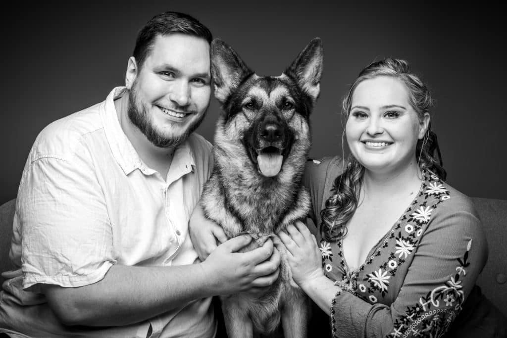family portraits with family pet in black and white